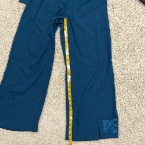 Francesca’s Teal Blue Mira Eyelash Lace Plunge Neckline Wide Leg Jumpsuit Sz XS - Picture 6 of 15